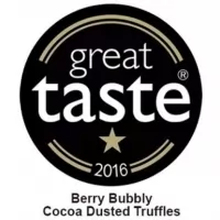 Trufe de ciocolata cu lapte, fructe de padure si zahar efervescent Monty 100g