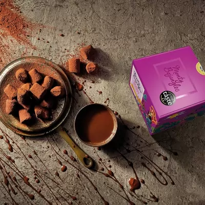 Trufe de ciocolata neagra si pudra de cacao Monty 100g