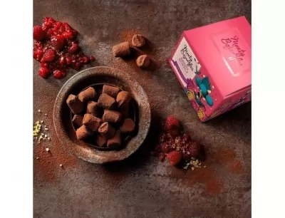 Trufe de ciocolata cu lapte, fructe de padure si zahar efervescent Monty 100g