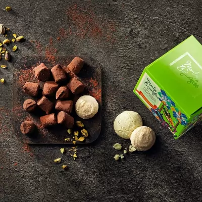 Trufe de ciocolata neagra si fistic Monty 100g